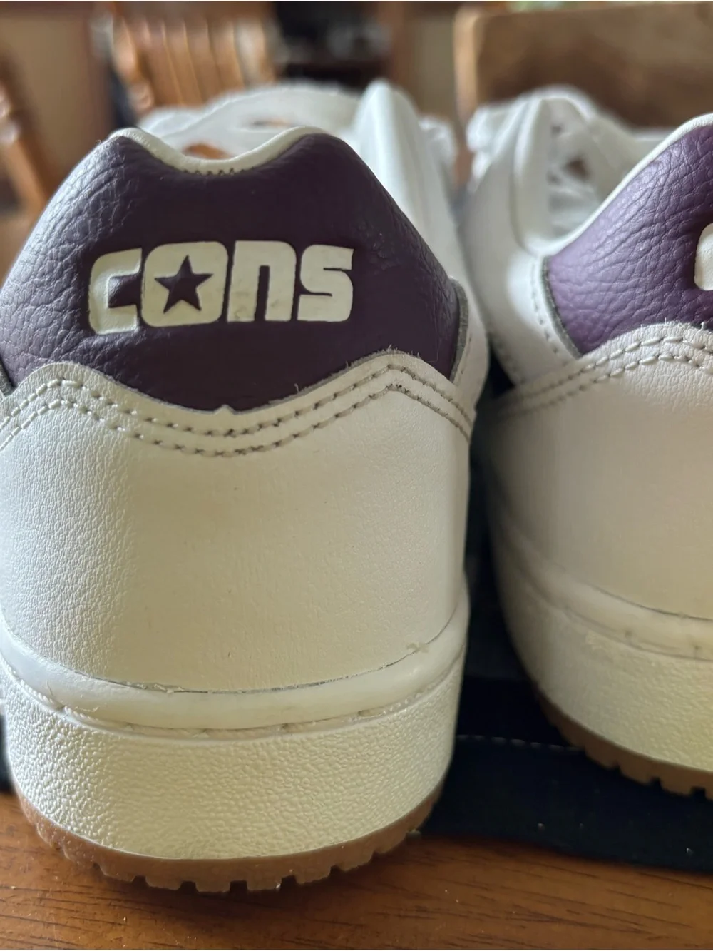 Converse Women’s Low-Top Sneakers in White and purple